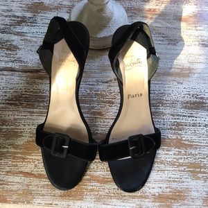 Louboutin velvet sandals.